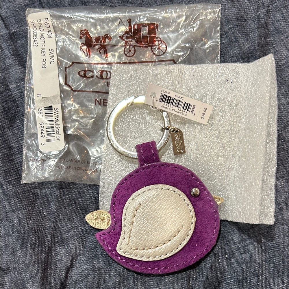 Coach Purple and Cream Bird Keychain